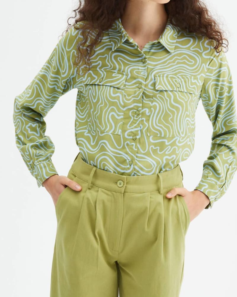 Front of a model wearing a size L Tibesti Print Button Down Blouse in Green in Green by Compania Fantastica. | dia_product_style_image_id:326690
